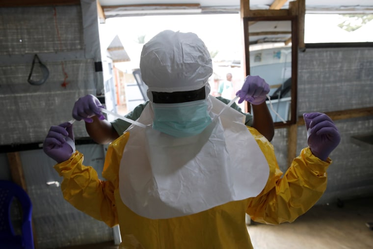 Image: A health worker at an Ebola treatment center in Beni, Congo