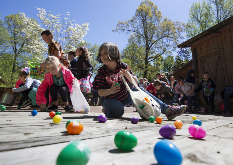 Image: Children race during an Easter egg hunt in Grand Rivers, Kentucky, on April 20.