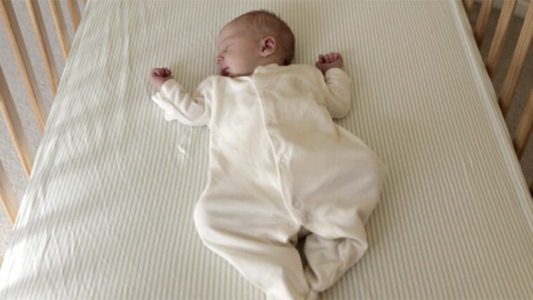 Baby sleeping hotsell on soft surface