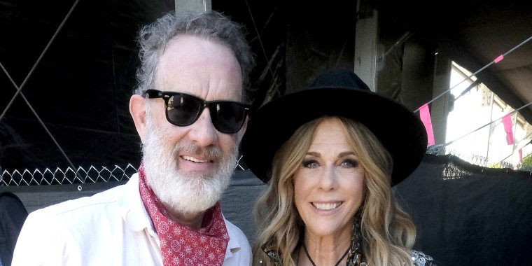 Rita Wilson took the stage at the Stagecoach country music festival on Saturday, and there to cheer her on was proud husband Tom Hanks.