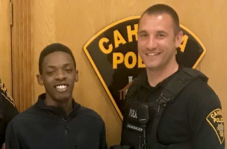 Image: Ka'Shawn Baldwin and Cahokia Police Officer Roger Gemoules.