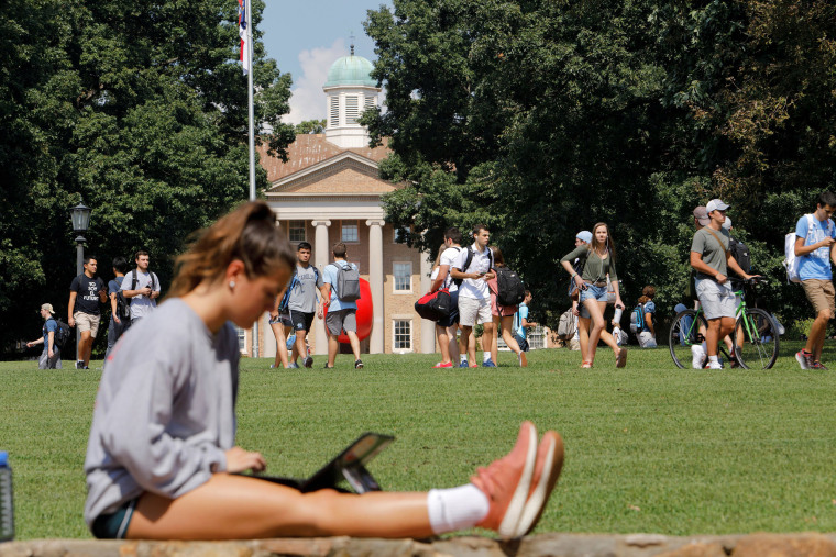 Image: Students walk through the campus of the University of North Carolina at Chapel Hill North Carolina