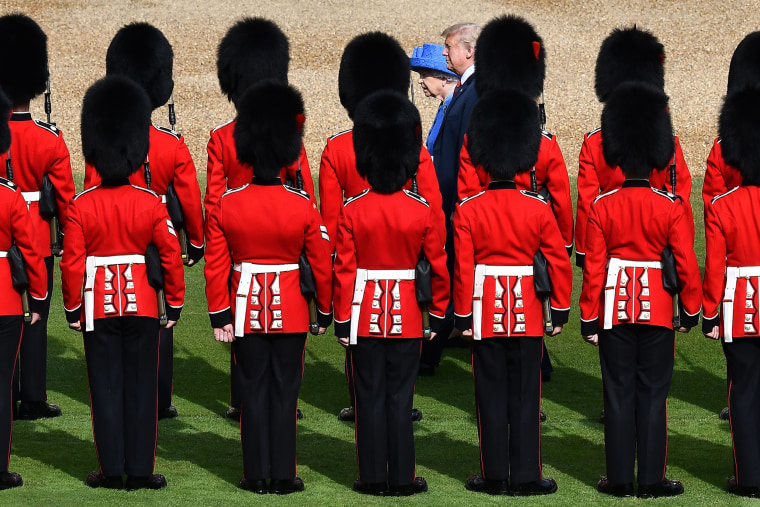 Image: Britain's Queen Elizabeth II and President Donald Trump inspect the guard of honour formed of the Coldstream Guards during a welcome ceremony at Windsor Castle in Windsor