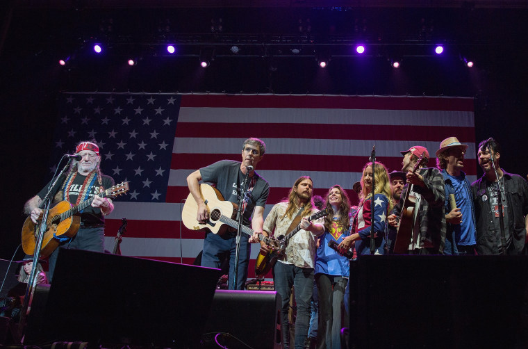 Beto O'Rourke, center, performs with Willie Nelson during the 45th Annual Willie Nelson 4th of July Picnic