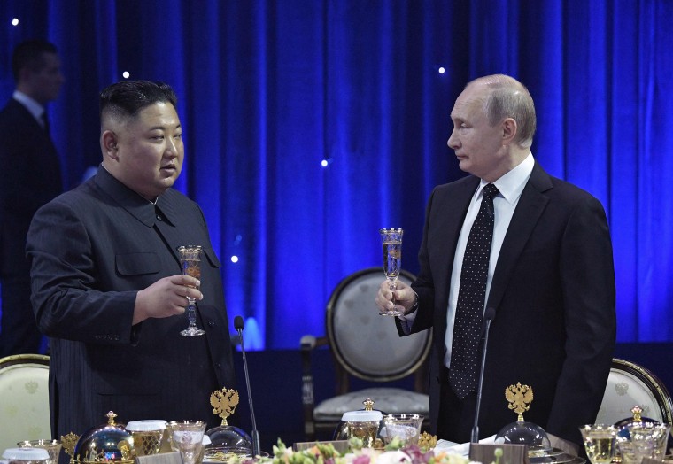 Image: Russian President Vladimir Putin and North Korean leader Kim Jong Un attend a reception following their talks at the Far Eastern Federal University campus on Russky island in the far-eastern Russian port of Vladivostok