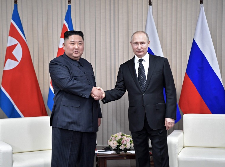 Image: Russian President Vladimir Putin meets with North Korean leader Kim Jong Un at the Far Eastern Federal University campus on Russky island in the far-eastern Russian port of Vladivostok
