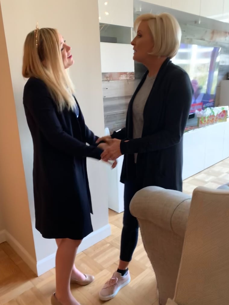 Mika Brzezinski greets Emily Cassidy at her surprise bridal shower.