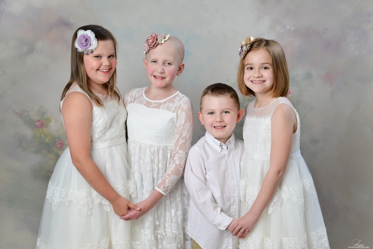 Connor Lloyd, 4, who is being treated for a form of leukemia, joined the girls in the photo shoot for a second straight year. 