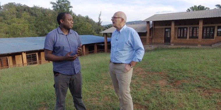 Rutagarama shows NBC colleague Harry Smith the grammar school he attended in Kigali, Rwanda's capital.
