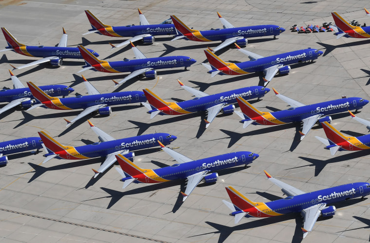 Image: Southwest Airlines Boeing 737 MAX aircraft are parked on the tarmac after being grounded at the Southern California Logistics Airport in Victorville, California