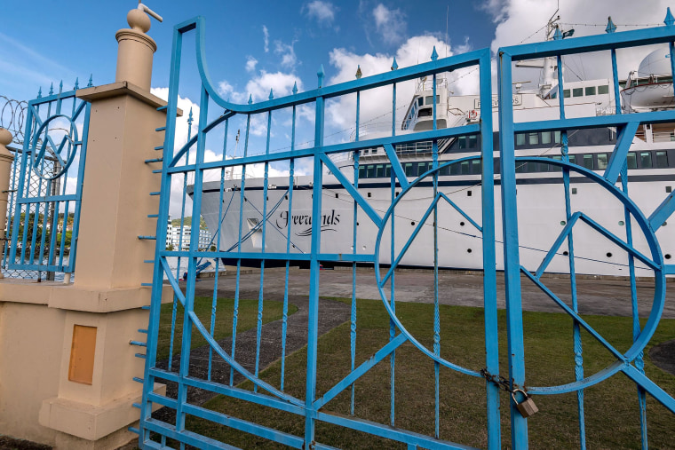 Image: The Freewinds cruise ship owned by the Church of Scientology is seen docked in quarantine at the Point Seraphine terminal in Castries, Saint Lucia