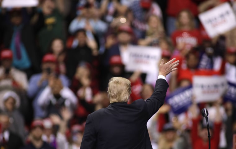 Image: President Donald Trump waves to the crowd after speaking to supporters at a Make America Great Again rally
