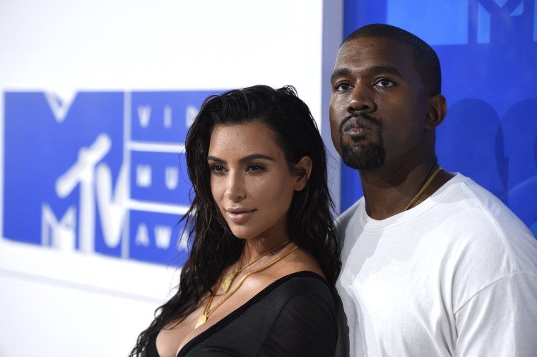 Kim Kardashian twins with hubby Kanye West in pairs of