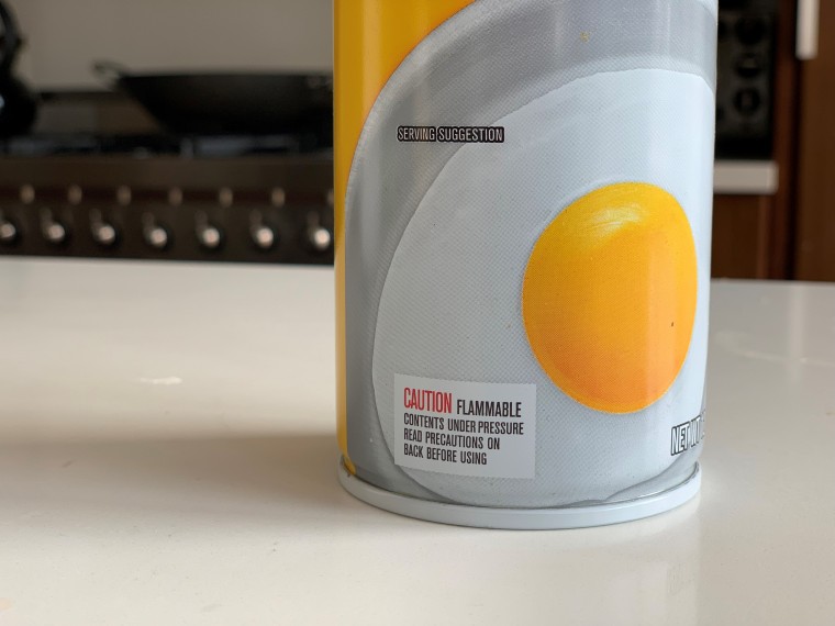 Caution label on the front of a can of Pam cooking spray