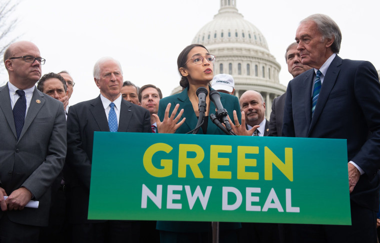 Image: Representative Alexandria Ocasio-Cortez and Senator Ed Markey speak during a press conference to announce Green New Deal legislation to promote clean energy programs