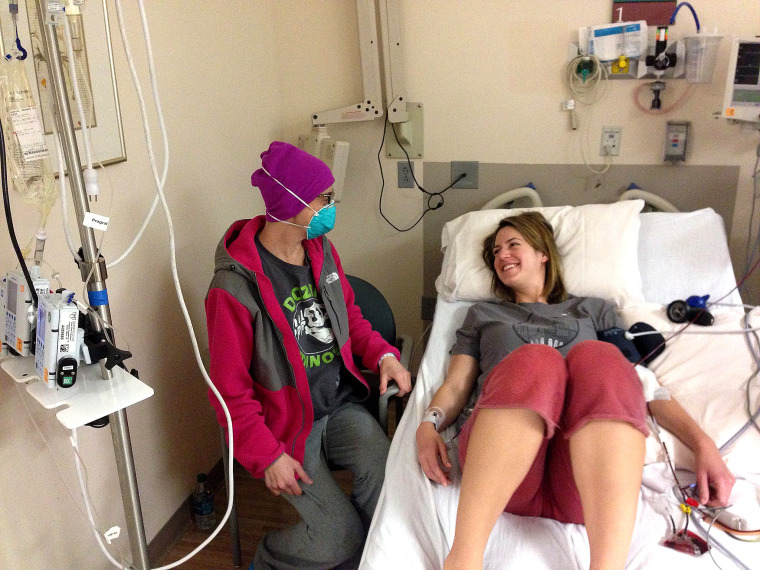 Deb Horning, left, prepares to get a stem cell transplant from her sister, Susan Piroth, in February 2015, at the Mayo Clinic hospital in Phoenix as part of Horning's leukemia treatment. As a result of chemotherapy and the transplant, Horning has weakened immunity but cannot get vaccinated against the measles until she finishes a course of immunosuppressant drugs.