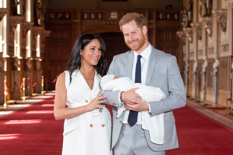 Image: The Duke and Duchess of Sussex with their baby son, who was born on Monday morning, during a photocall in St George's Hall at Windsor Castle in Berkshire