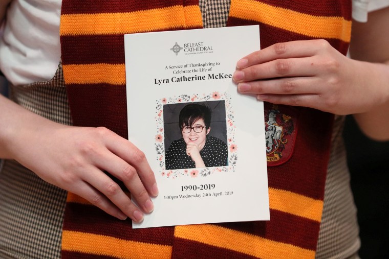 Image: A mourner wearing a Gryffindor scarf holds an order of service as she arrives for the funeral of murdered journalist Lyra McKee at St Anne's Cathedral in Belfast, Northern Ireland