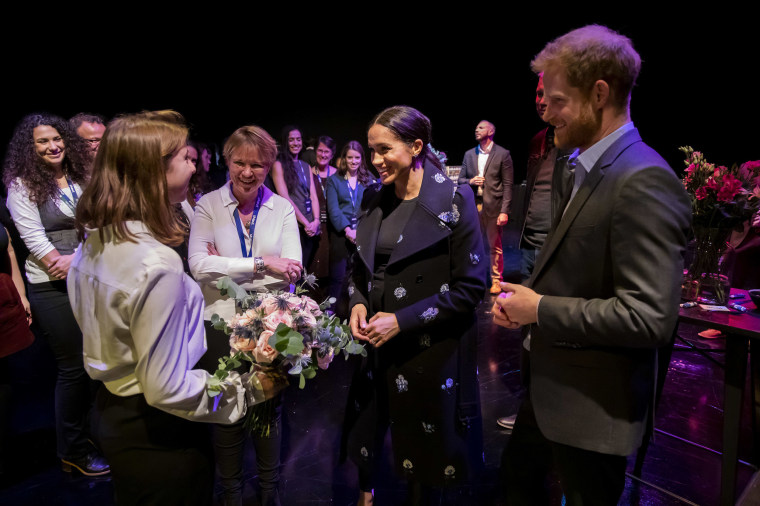 Image: Britain's Prince Harry, Duke of Sussex and Meghan, Duchess of Sussex meet Crisis Volunteers working with Shout, a free text messaging service which aims to provide 24/7 support for anyone experiencing mental health crisis