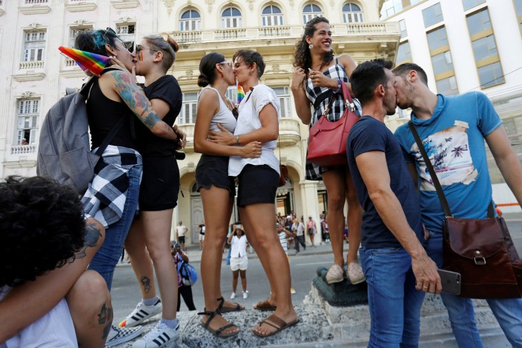 Image: LGBT activists kiss during a demonstration against homophobia and transphobia in Havana on May 11, 2019.