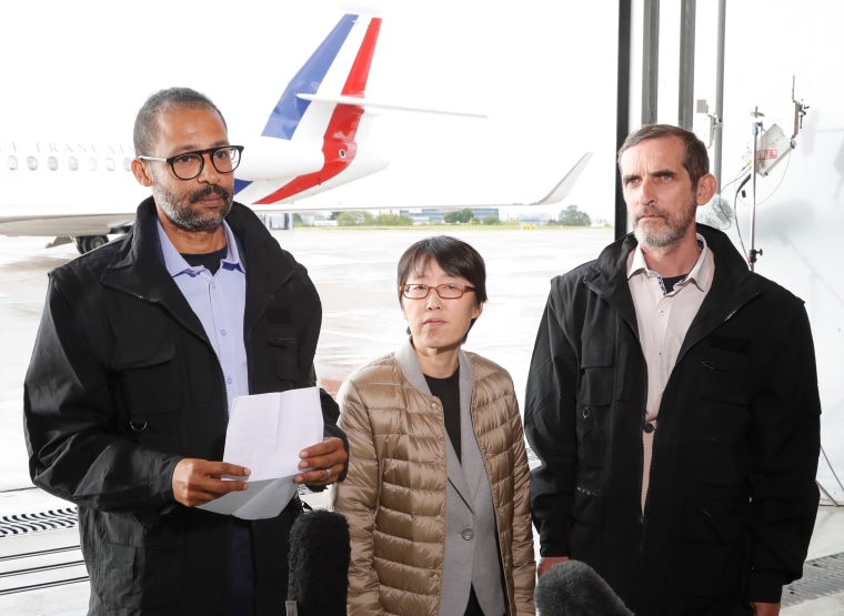 Image: Laurent Lassimouillas, an unidentified South Korean hostage and Patrick Picque