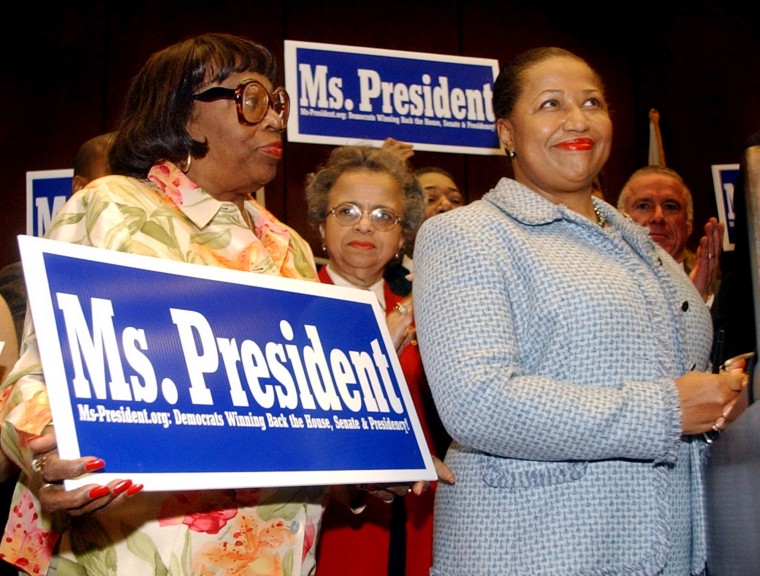 Image: Former Illinois Sen. Carol Moseley Braun meets with supporters in Chicago in 2003.