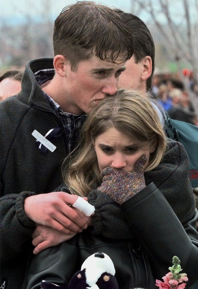 Austin Eubanks, shown at a memorial service in 1999 after being injured in the Columbine shooting, was found dead at 37 on Saturday. 