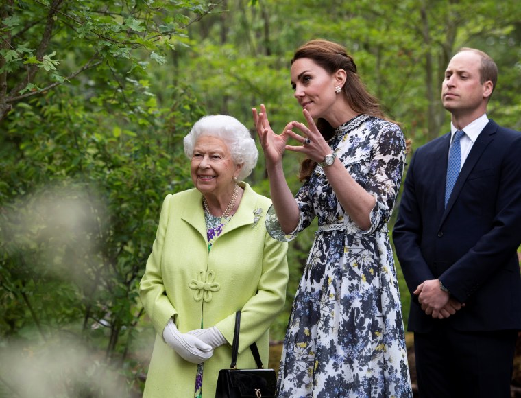 Queen Elizabeth II with Prince William and Catherine Duchess of Cambridge at the Chelsea Flower Show in London