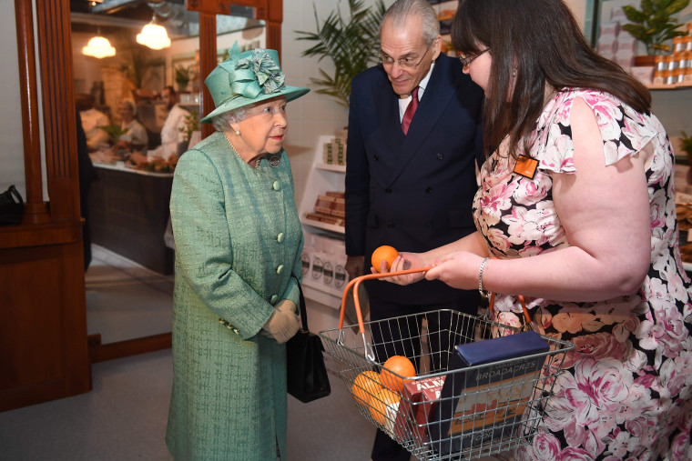 Queen Elizabeth visits replica of one of the original Sainsburys stores