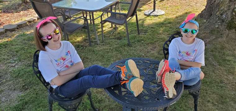 Hailey and Hannah get ready to spend their weekend selling lemonade in bandanas and sunglasses. It's hard work but it's worth it.