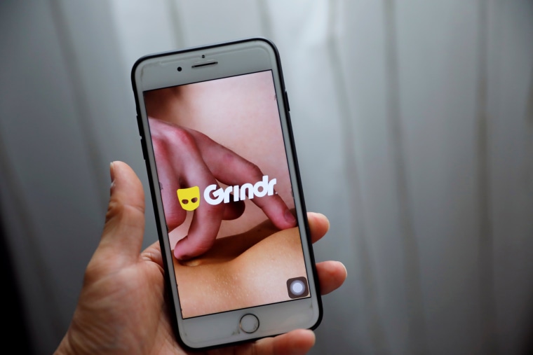 Image: Grindr app is seen on a mobile phone in this photo illustration taken in Shanghai