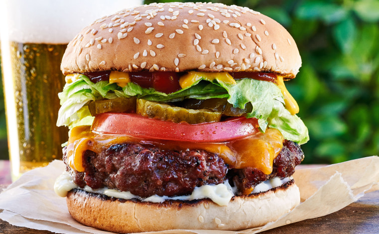 If you press a little dimple into the center of each patty, that will keep the burgers from puffing up in the center, so you have a flatter surface for all your favorite toppings.