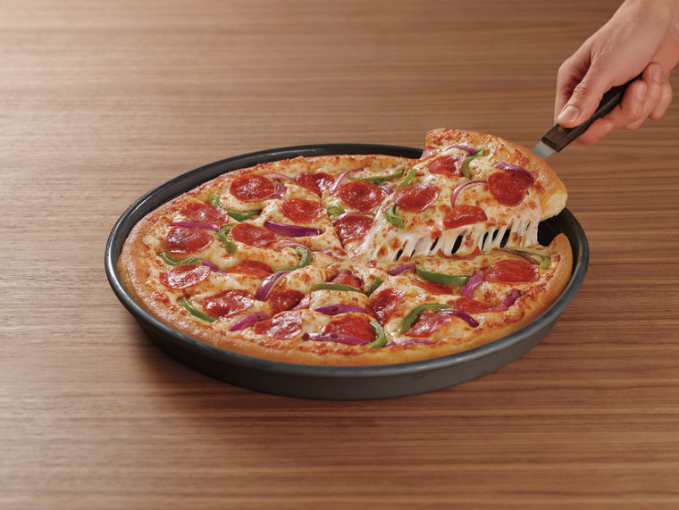 The Original Pan Pizza is a little extra cheesy, a little extra saucy and a little extra OG.