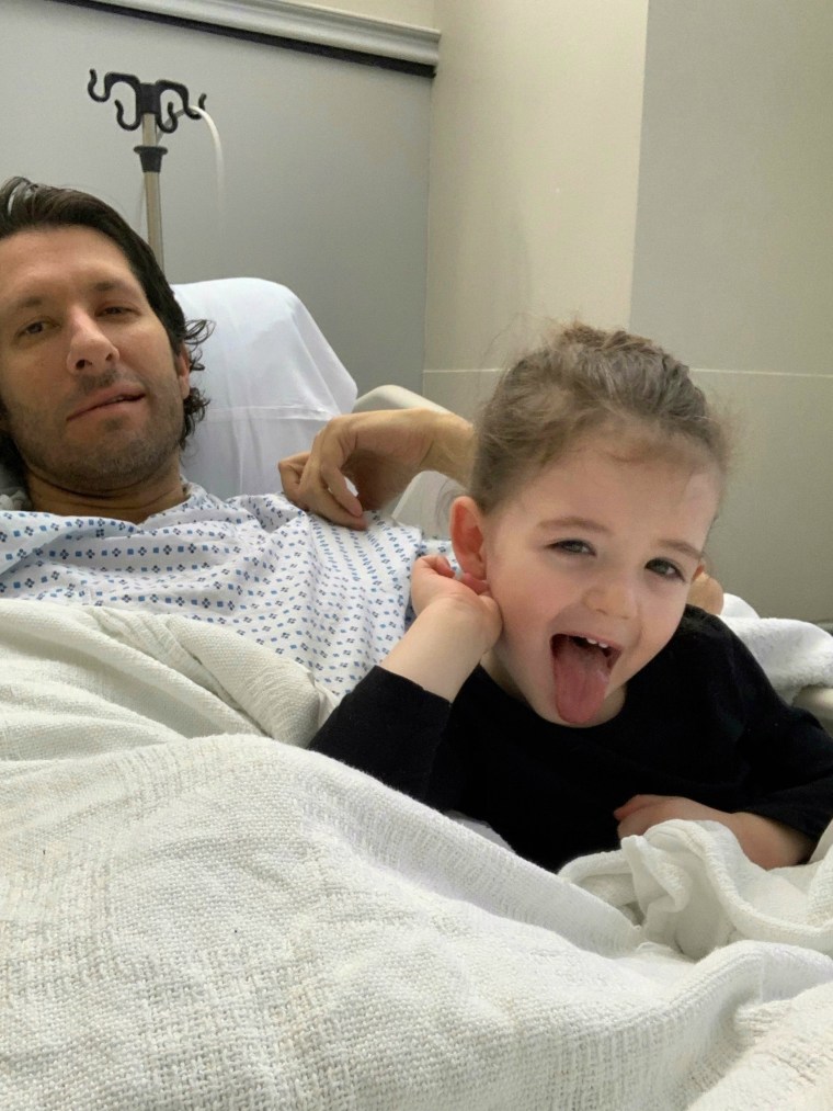 Michael and my son, Miles, in the hospital bed.