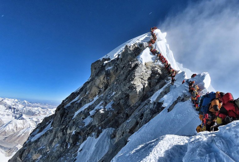 Image: Climbers line up near the summit of Mount Everest