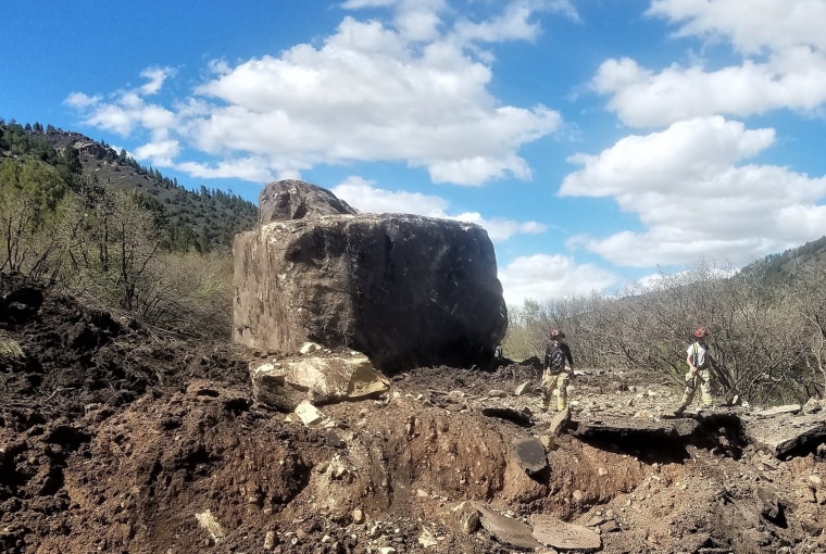 A rockfall in Colorado sent two giant boulders weighing millions of pounds onto a remote state highway
