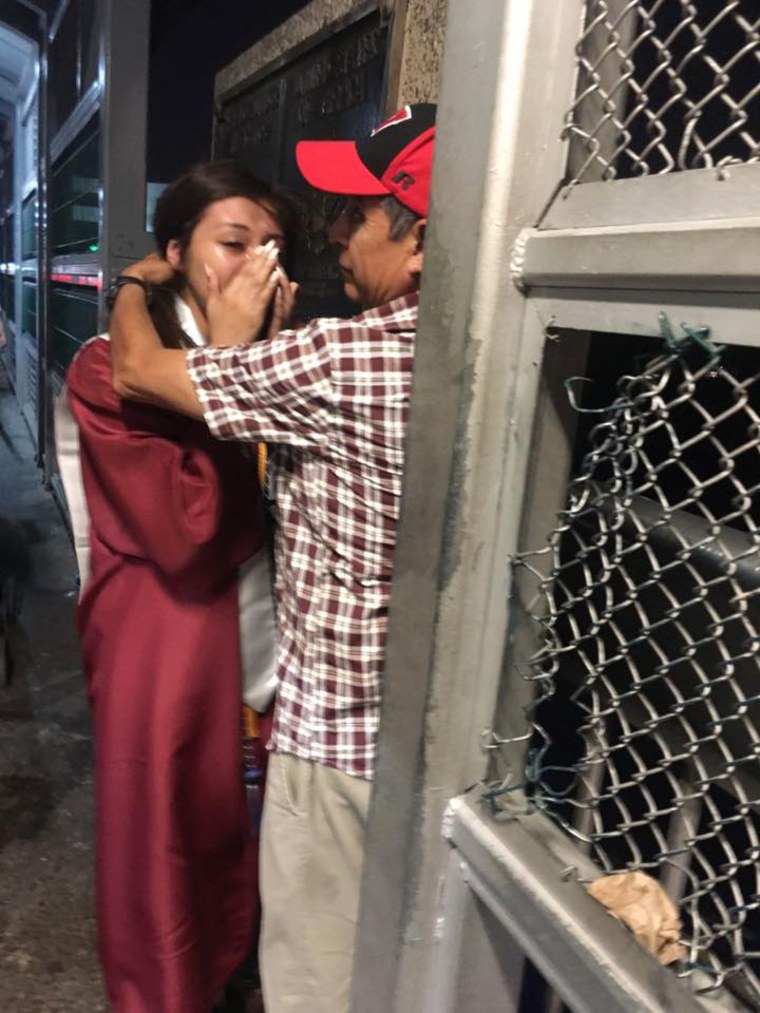 Sarai Ruiz met her father after on the Gateway to the Americas Bridge so he could see her in her graduation attire.