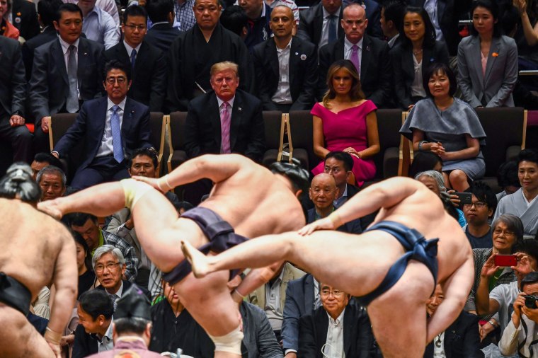 President Donald Trump first lady Melania Trump watch a sumo demonstration with Japan's Prime Minister Shinzo Abe and his wife Akie Abe in Tokyo on May 26, 2019.