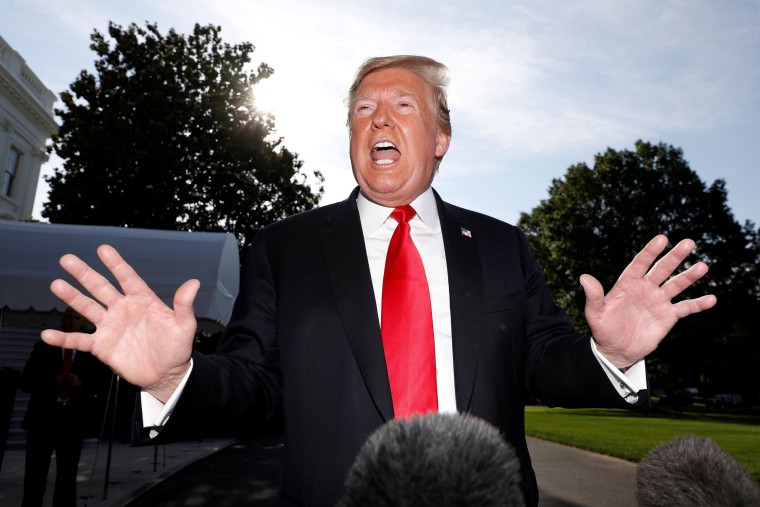 Image: President Donald Trump speaks to reporters at the White House 