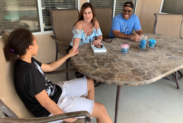 Bernadette Martinho-Brewer spends time with her family at her home in Tulare, California.