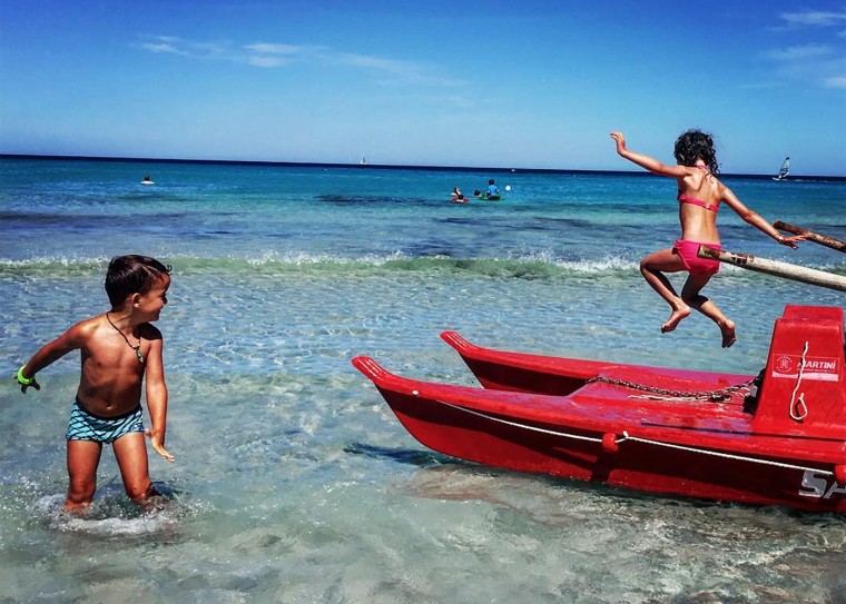 Sardinian children playing at the beach.