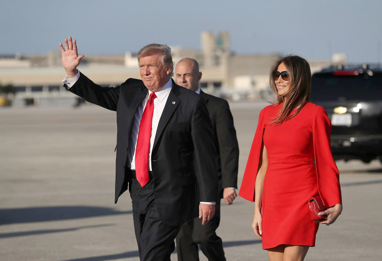 Melania Trump wears a red cape dress for dinner with Prince Charles