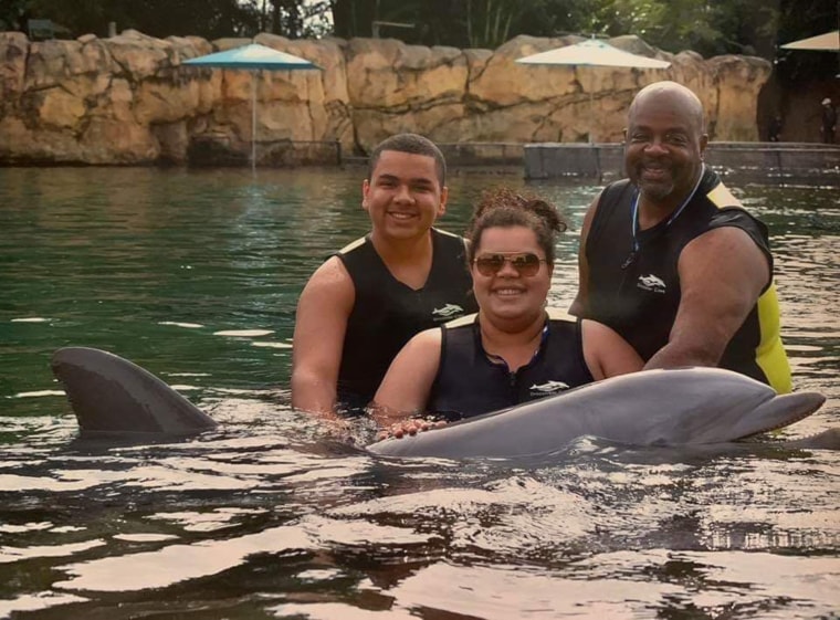 Isaiah and his family made a special friend at Discovery Cove.