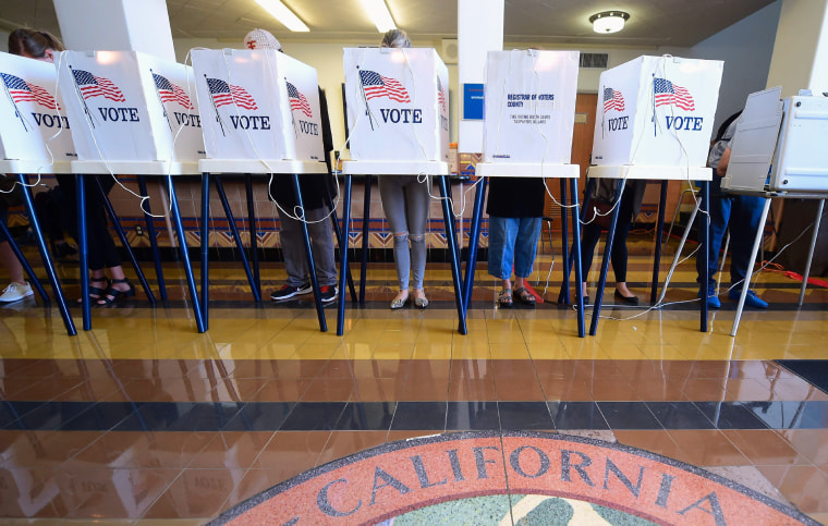Image: People vote in the U.S. presidential election at Santa Monica City Hall