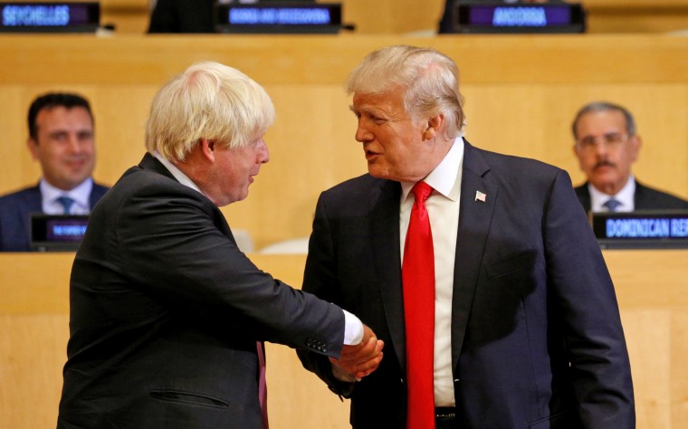 U.S. President Donald Trump shakes hands with British Foreign Secretary Boris Johnson as they take part in a session on reforming the United Nations at U.N. Headquarters in New York