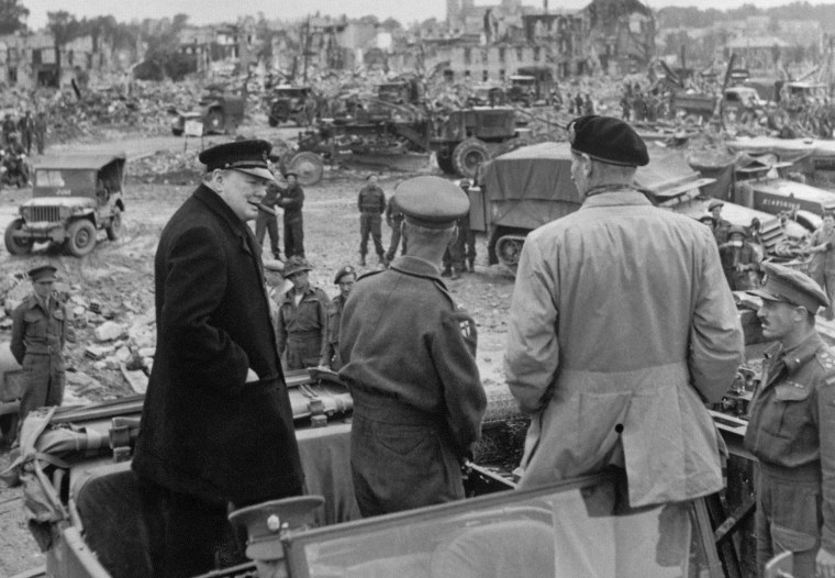 Image: British Prime minister Winston Churchill, Sir Miles Dempsey, British second Army commandant, and British Field Marshal Bernard Montgomery visit the destroyed city of Caen