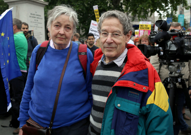Image: Isabel and Tom Rivers  take part in the demonstration against President Donald Trump in London