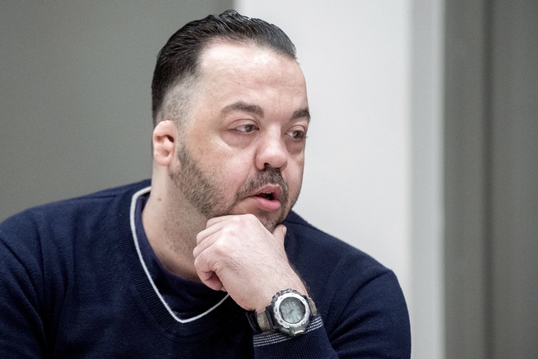 Image: Former nurse Niels Hoegel sits in the court room during a session of the district court in Oldenburg