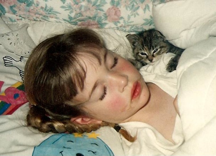 Morgan with her Kitten.