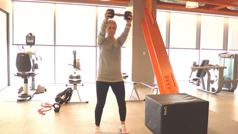 Monique Lamoureux-Morando demonstrating a 45-degree dumbbell press.